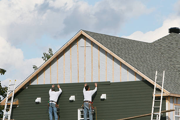Professional Siding technician working in District Heights, MD